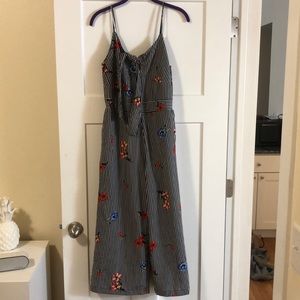 Black and white pin striped floral jumpsuit